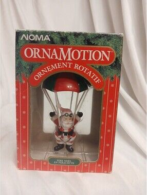 Vntg. 1989 Noma OrnaMotion Parachuting Santa Rotating Ornament